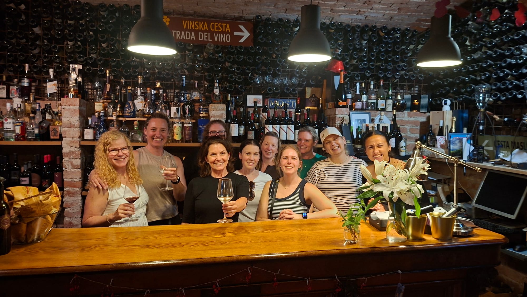 Damesly travelers enjoying an evening together at a wine bar